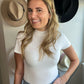 white ribbed bodysuit with mock neck