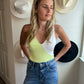 green and white bodysuit