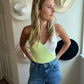 green and white bodysuit