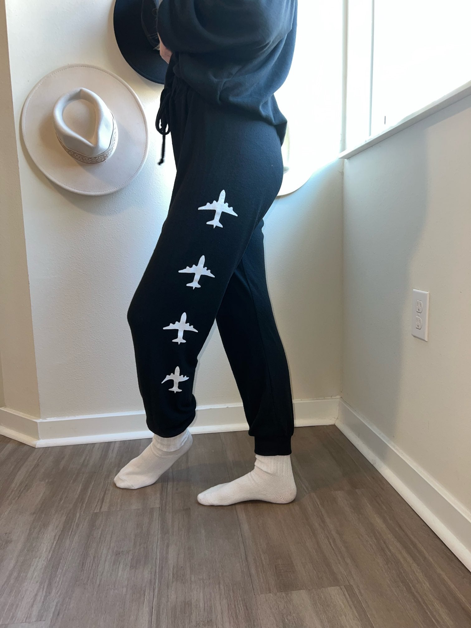 black joggers with airplanes