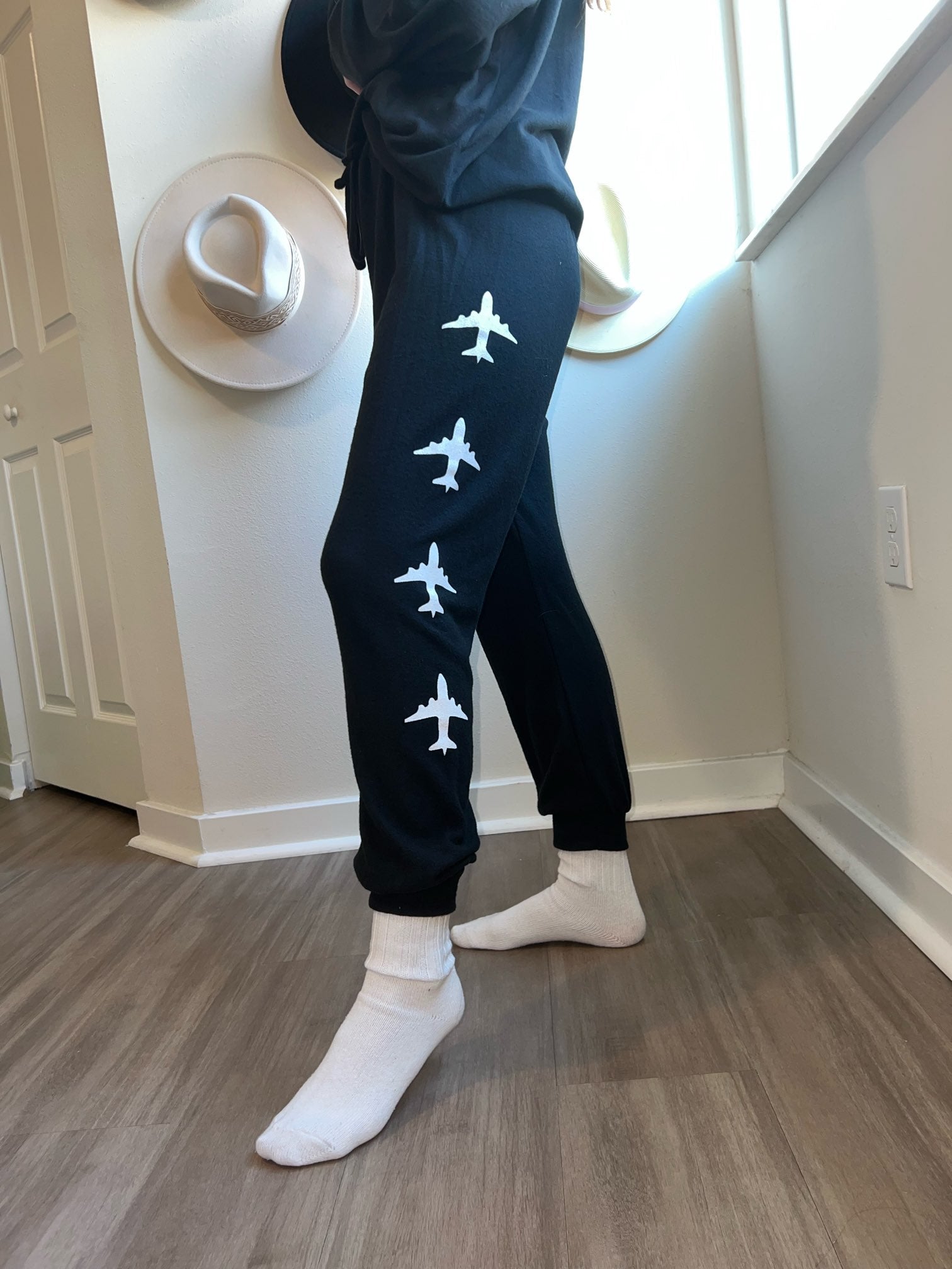 black joggers with airplanes