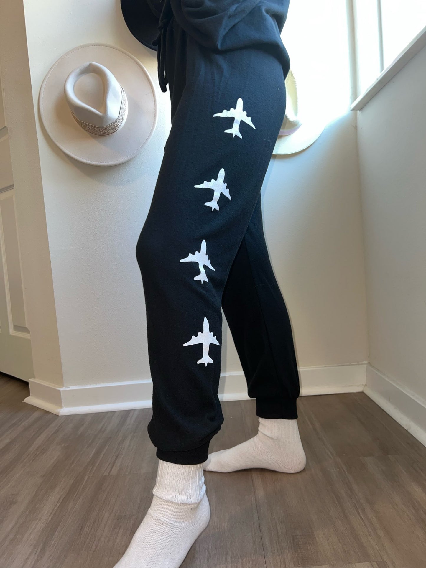 black joggers with airplanes